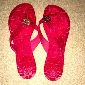 Like new Tory Burch pink and gold jelly flip flops